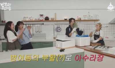 Seulgi holding a fish