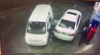 WCGW when trying to rob someone who is loading his car with gasoline