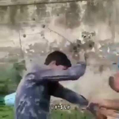 Hindutva goons beating a Muslim boy who came to drink water in a temple