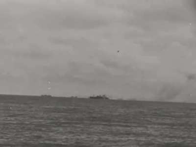 British Armed Merchant Cruiser HMS Jervis Bay taking fire from German heavy cruiser Admiral Scheer while escorting Convoy HX 84 on November 5th 1940