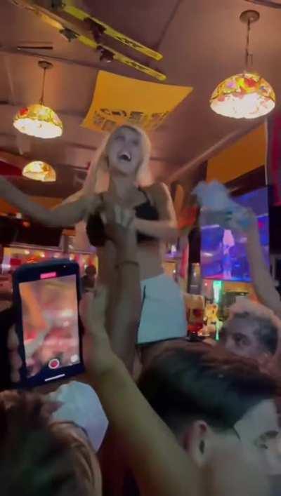 Argentine with huge tits flashing the entire bar after a win