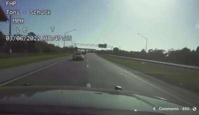 Dashcam video of a highway patrol officer in FL stopping a drunk driver heading towards thousands of runners during a 10k foot race.