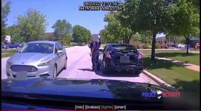 Car randomly pulls up next to a cop, driver jumps out with an axe