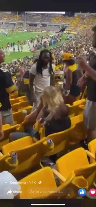 Girl hits guy and he defends himself and he knocks her man clean out