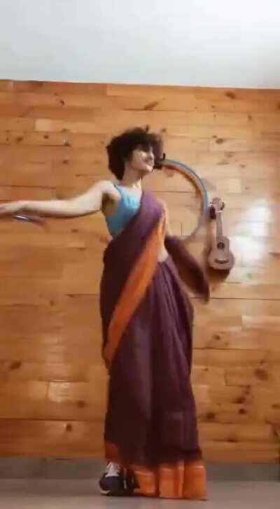 Just a simple girl in a saree and her hoop genda phool..