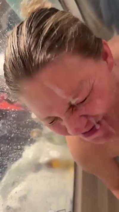 Slut taking a thick load down her chin