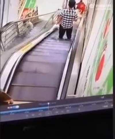 Chinese reckless father put shopping basket with toddler on escalator. Guess you all know what happened next.
