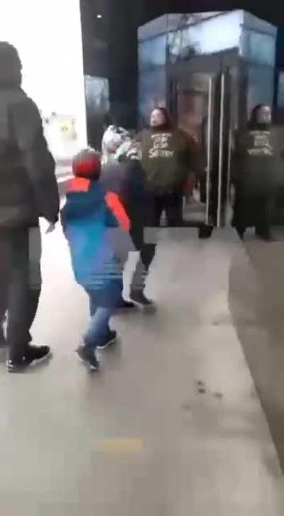absolute unit chains himself to McDonalds door in Russia before its set to close due to the invasion, screams it “is an act of hostility against me!”