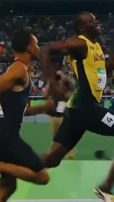 His happy face for running alongside the Bolt without caring if he will win or not