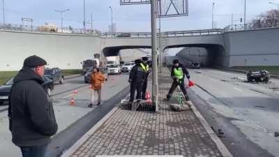 Man hospitalized after his car gets split in half by a pole