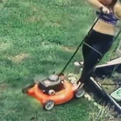 Dragging the lawnmower towards you as you fall