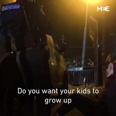 Palestinian woman confronts Israeli soldier