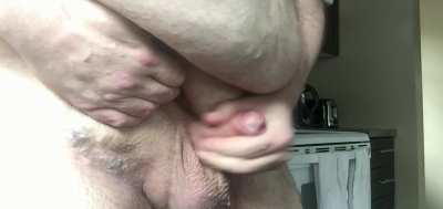 Big guy with a little guy,  was house-sitting for a friend for a few days when they went on vacay. Came hard and fast standing in their kitchen with the window curtains wide open and the neighbours roaming about outside.