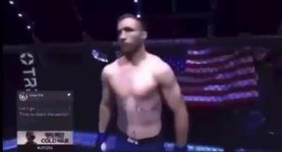 Bruce Buffer when Izzy walks into the cage with the dog collar