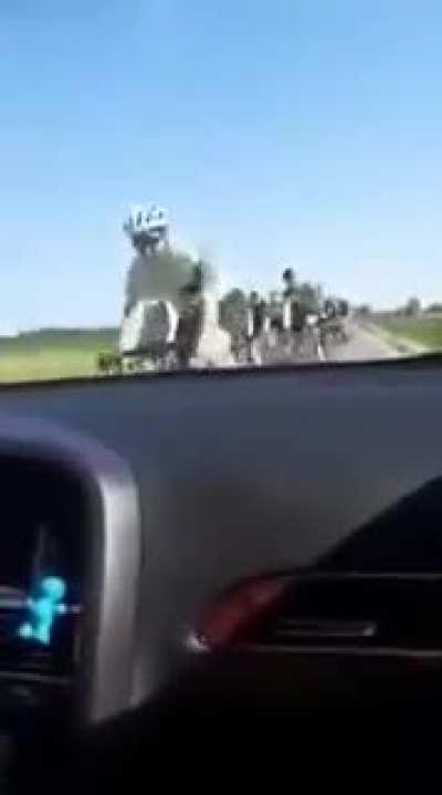 Cyclists crashing into parked car