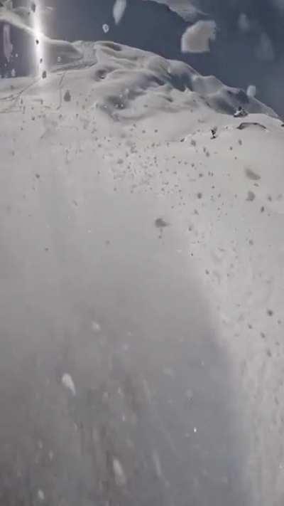 Skiing down this mountain ridge