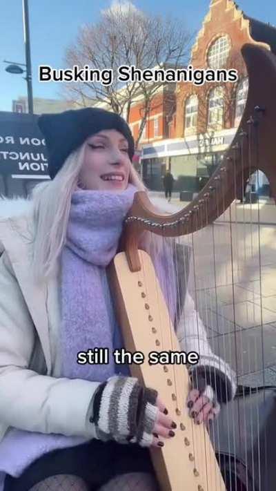 Karen against a performer