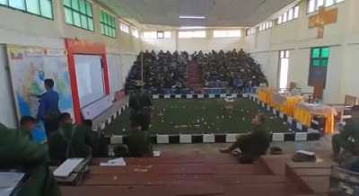 A Myanmar military cadet reciting a battle plan from memory during a briefing in a DSA classroom in Pyin Oo Lwin.