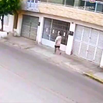 Walking calmly on the sidewalk