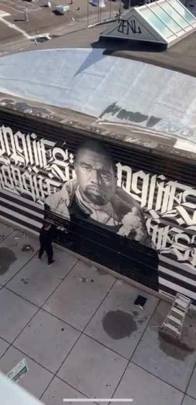 Painting over the kanye mural in chicago