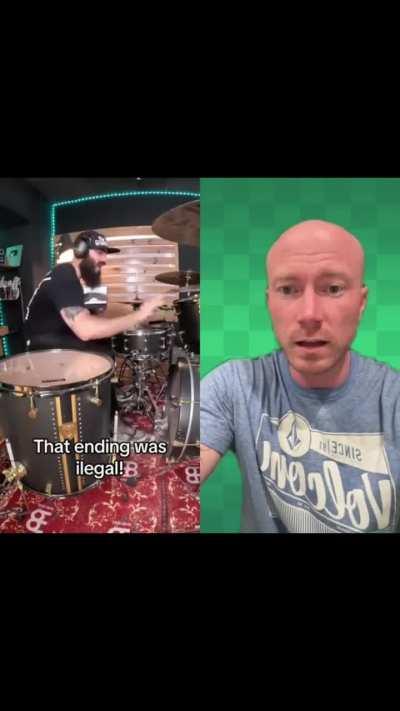 Drummer on the right is gobsmacked at just how amazing this guy is.