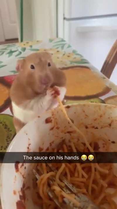 the sauce on his hands