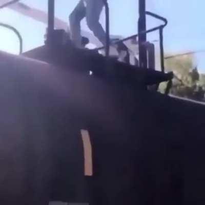 Dude busts his ass while trying to look cool in front of his friend.