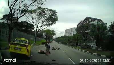 Van knocks into motorcycle causing it to fly across to the other side of the road