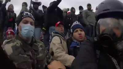 AP photographer attacked and dragged by trump mob.