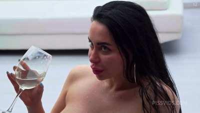 Plastic Bimbo gets a golden Shower and drinks piss