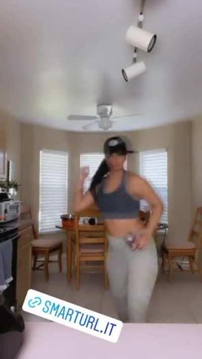 Dancing and showing off her ass