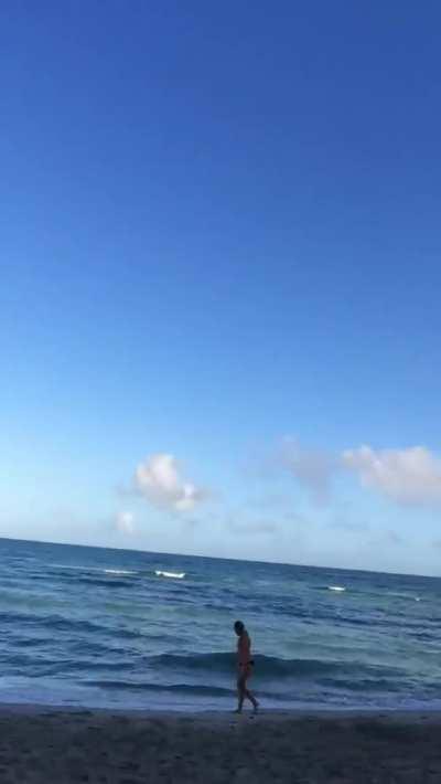 Trying to be sneaky on the beach