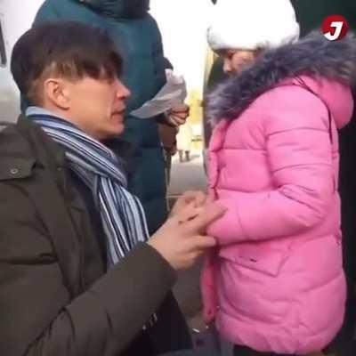 A Ukrainian father says goodbye to his family, while he stays behind to fight the Russians