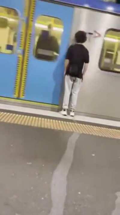 Standing really close to a passing train.