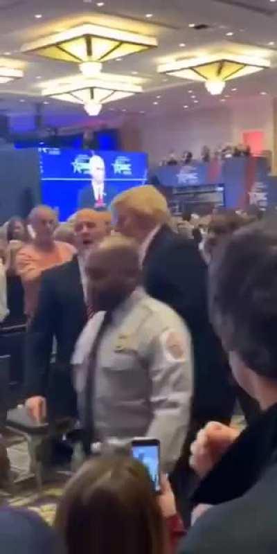Borat being kicked out while impersonating Trump for his upcoming movie.