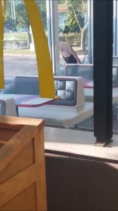 NSFW: Zombie breaks into McDonald’s window and wreaks havoc in establishment