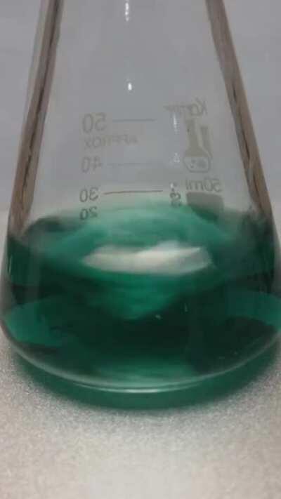 Beautiful display of different oxidation state colors of manganese.