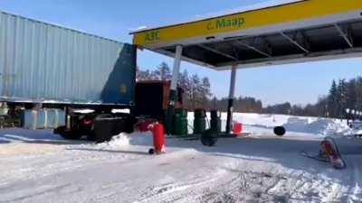 Truck destroys gas station