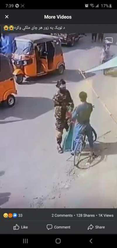 Taliban pig 🐷 snatches Afghan flag from civilian