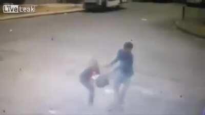 One thief pistol-whips a woman during a robbery, causing a bullet to discharge and kill his accomplice.