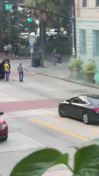 Man throws smoke canister and draws weapon on protester. (Savannah, GA)