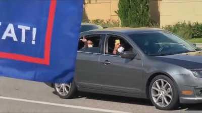 Small roadside Trump rally triggers everyone