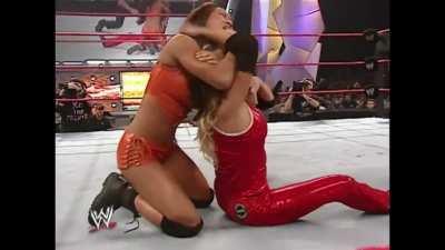 Gail Kim ambushes Trish Stratus from behind choking her out with her own jacket! Gail controls Trish with the longest sleeperhold ever!