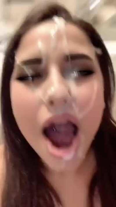 Her face is so pretty covered in cum