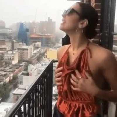 Playing with her breasts