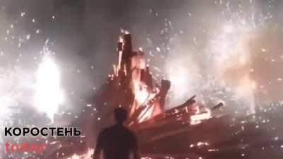 A man pours gasoline near the fireworks and the gasoline explodes. The video shows the same event, but shooting from different smartphones.