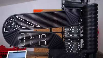 Creator ivan miranda made a clock that tells time with black & white marbles