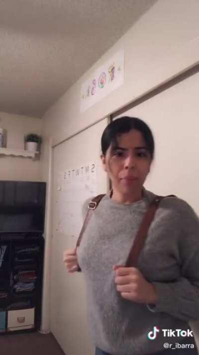 Human goes crazy over backpack purse contraption.