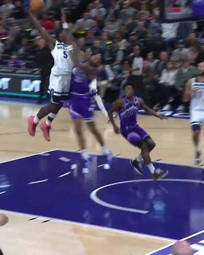 Minnesota Timberwolves Anthony Edwards dunks over Utah Jazz John Collins