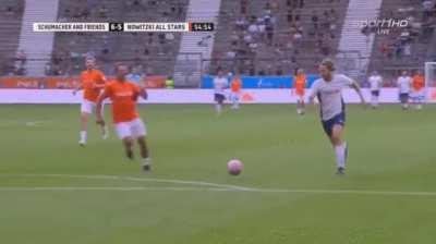 Sebastian Vettel scoring a banger during a charity football match